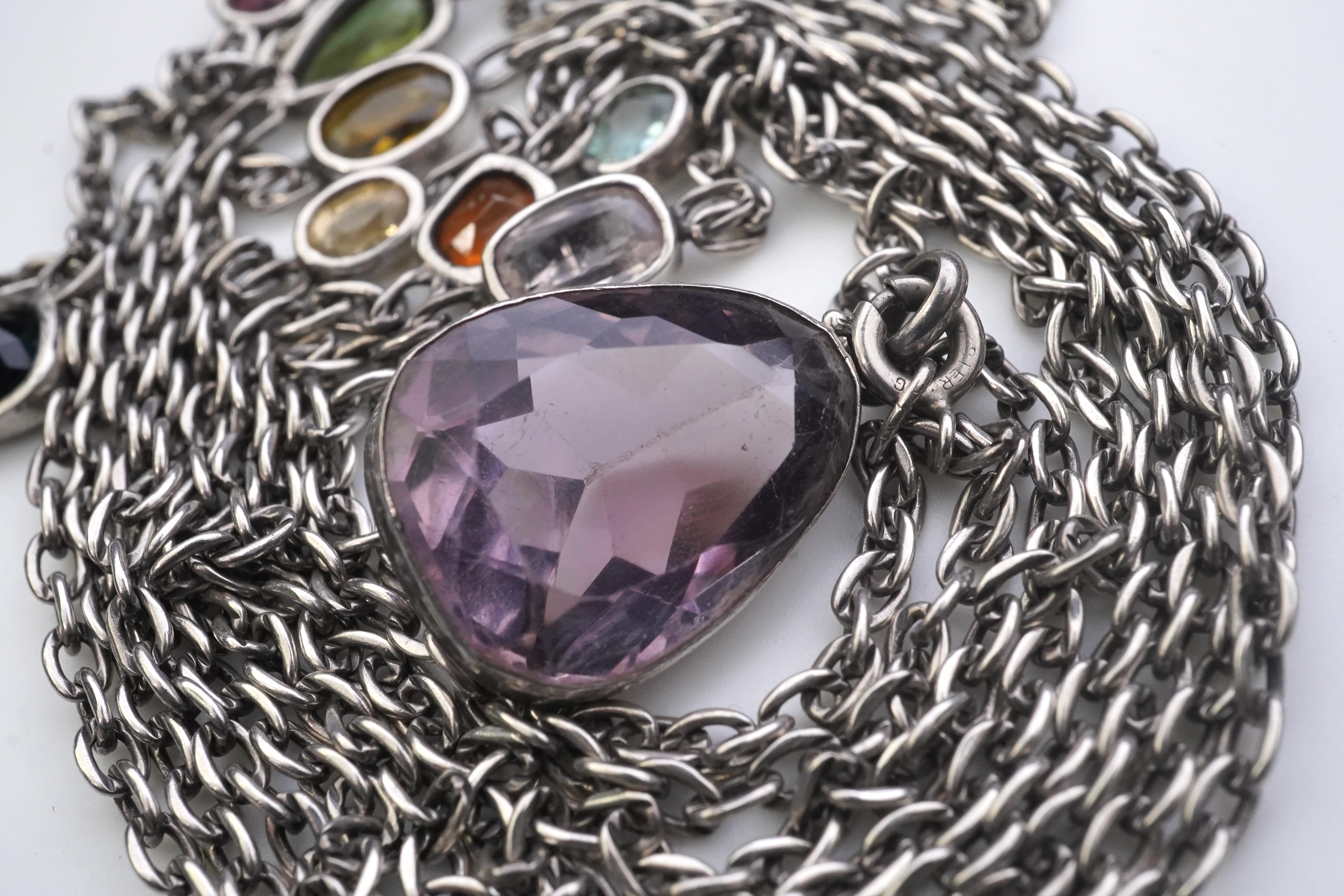 A collection of silver and gem-set jewellery